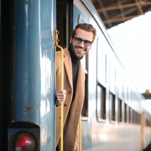Man looking out of a train